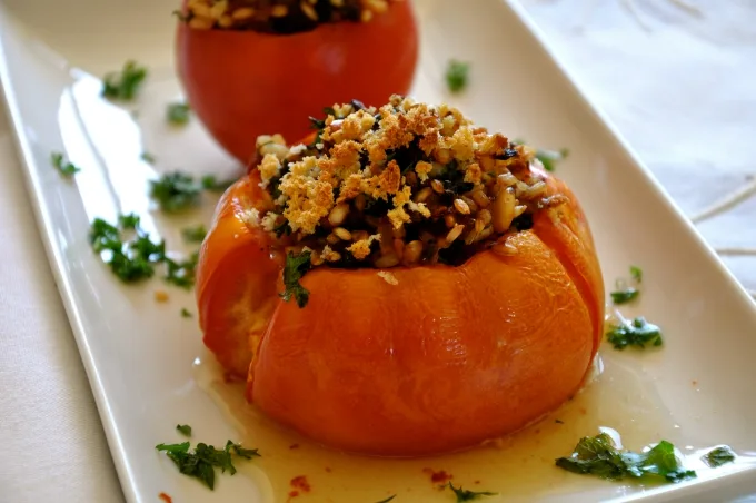 Roasted Stuffed Tomatoes with Rice, Currants & Pine Nuts