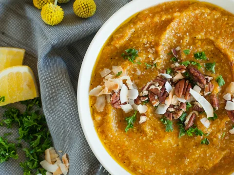 Creamy Squash Soup with Corn, Toasted Pecans, and Coconut