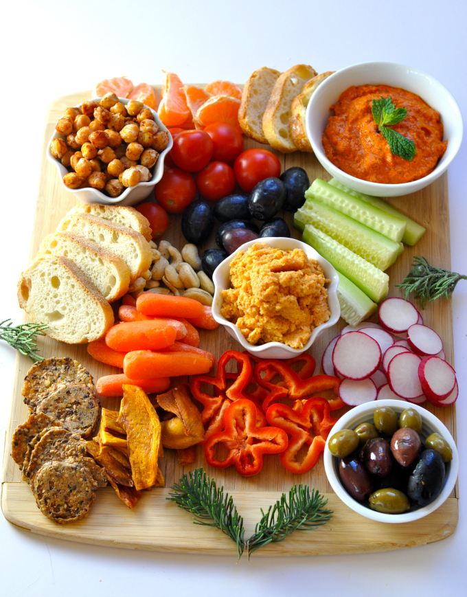 Minty romesco dip, cauliflower hummus, spicy garbanzo beans, nuts, dried fruit and fresh vegetables make these vegan appetizers stand-out. (#vegan) ordinaryvegan.net