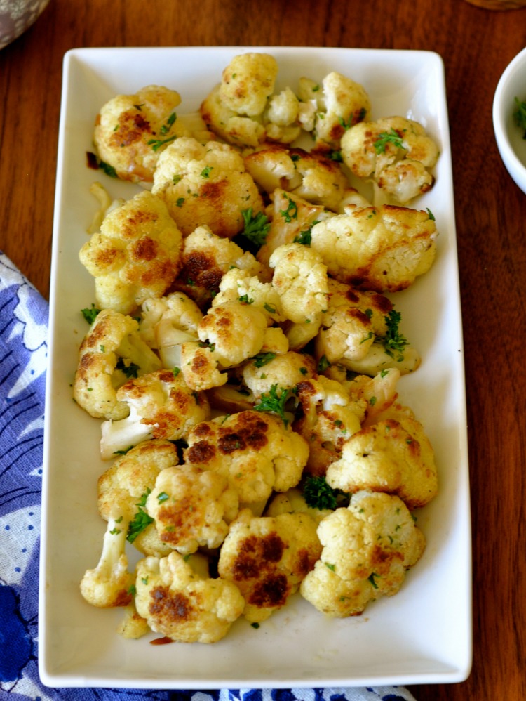 This cauliflower recipe explodes with flavor from a simple yet extraordinary profile of flavors including garlic, vinegar and parsley.(#vegan) www.ordinaryvegan.net