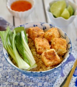 Treat your tastebuds to the crispy coconut flavors of this gluten-free easy baked tofu. This tofu can be enjoyed as a snack, on a salad or as meal of its own. (#vegan) ordinaryvegan.net