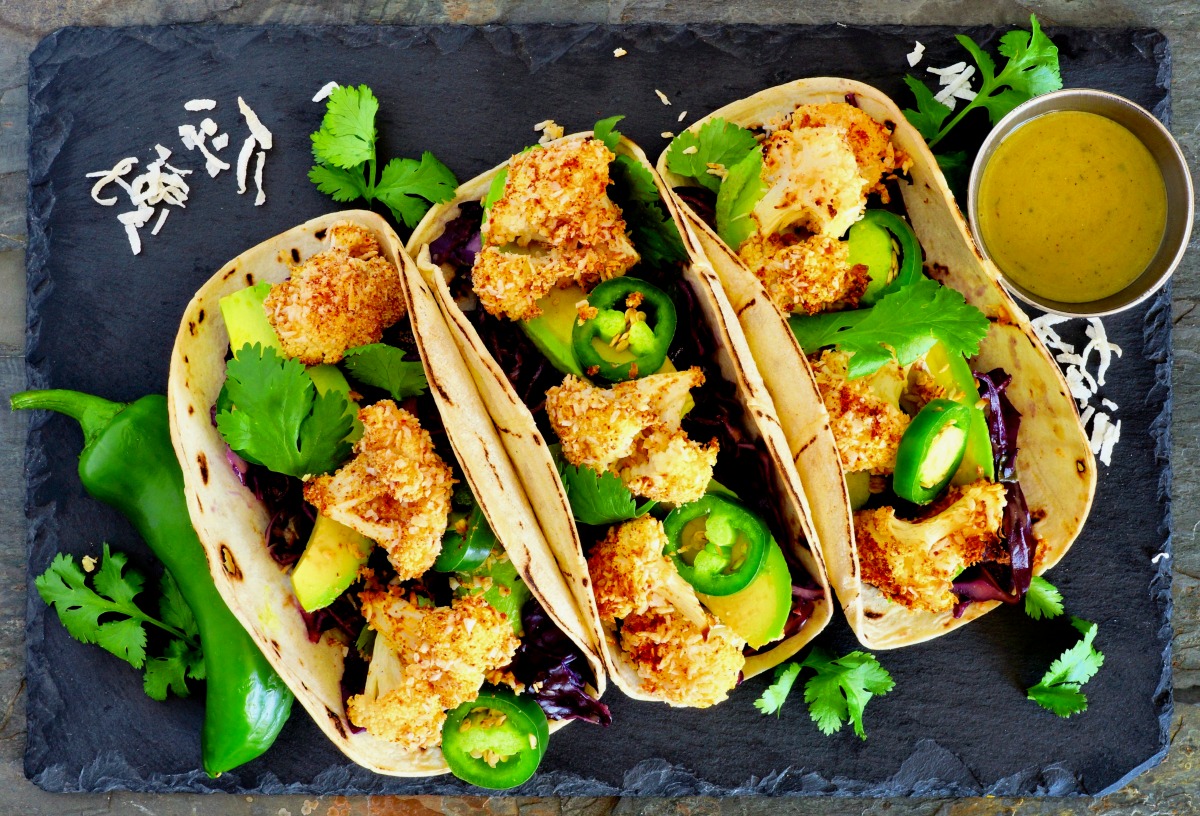These healthy, gluten-free vegan cauliflower tacos explode with crunchy texture and flavor, and topped with the perfect tangy and sweet mustard sauce. (#vegan) ordinaryvegan.net