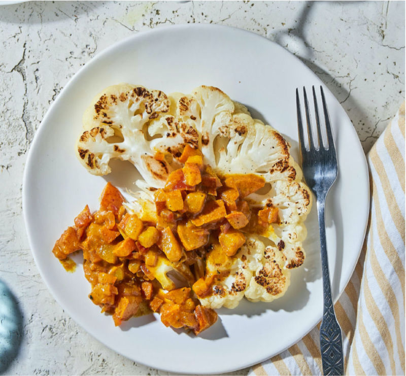 These cauliflower steaks have just a few ingredients but a big payoff. Topped with a sweet and savory condiment with a delicate taste of curry. (#vegan) ordinaryvegan.net